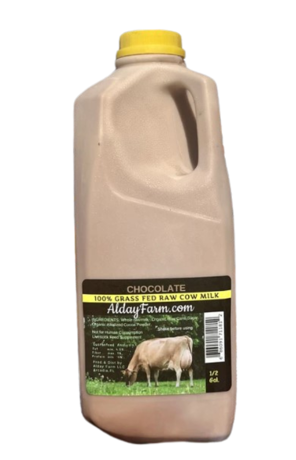 A bottle of Alday Farm Raw Cow Milk Chocolate with a yellow cap, against a plain background.
