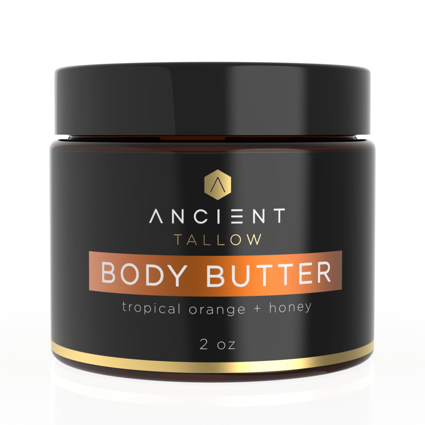 A jar of Ancient Tallow Body Butter with the label showing Tropical Orange & Honey. The jar is 2 oz and has a black lid and label with gold and orange text.