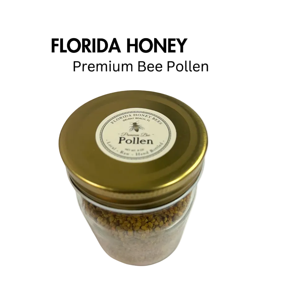A clear glass jar filled with bee pollen, with a gold-colored lid. The label on the jar reads 'Florida Honey Bees - Premium Bee Pollen'.