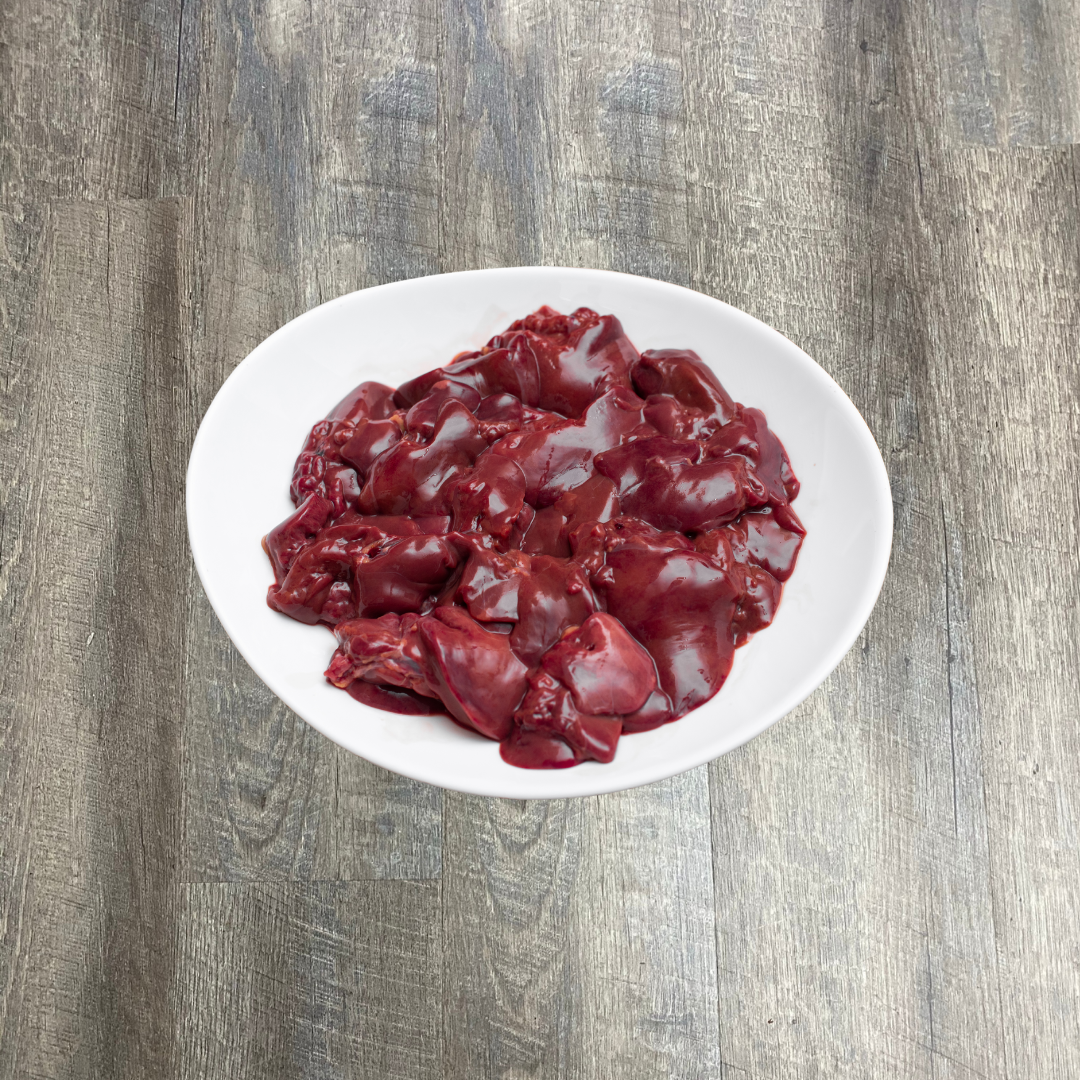 Natural raw chicken liver chunks for pets, offering nutrient-rich organ meat in a 1 lb portion