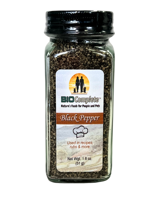 A bottle of BioComplete Black Peppercorn, with the label showing the product name and the statement 'used in recipes for cooking or baking'.