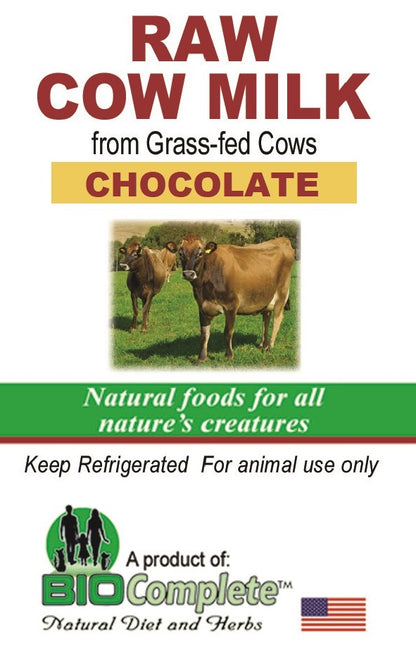Packaging for BioComplete Raw Cow Milk Chocolate with image of cows on the front, text detailing the source of the milk, and a statement for animal use only.