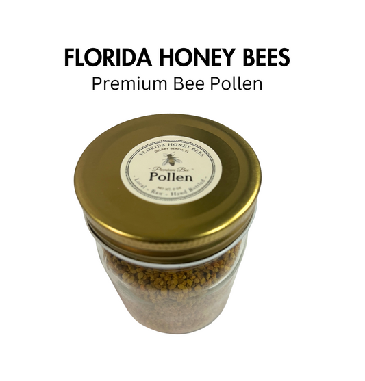 A clear glass jar filled with bee pollen, with a gold-colored lid. The label on the jar reads 'Florida Honey Bees - Premium Bee Pollen'.