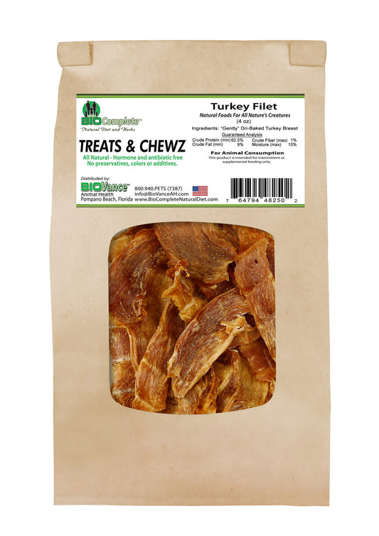 Packaged BioComplete Natural Baked Turkey Breast Filet Treats in a clear plastic pouch within a brown cardboard backing.