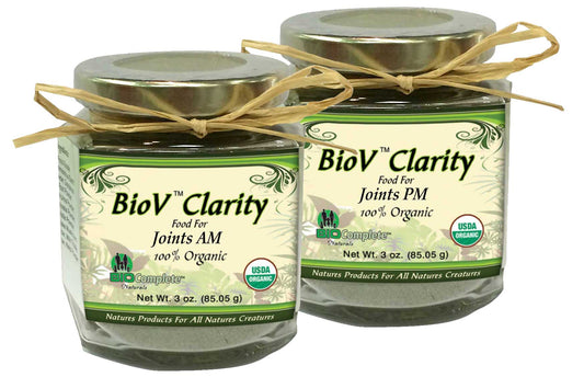 Two glass jars with labels, one labeled as 'BioV Clarity joint AM/PM blend organic herbal food package' and the other with similar text but specifies 'PM'. Both jars have a burlap fabric cover on top.